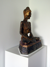 The 19th century Buddha sits on a custom lacquered sculpture pedestal.