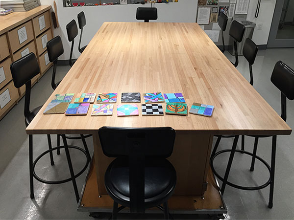 Art Boards Large Rolling Art Studio Work Table is 4 foot x 8 foot. The large butcher block top is versatile and can seat 10 individual art students comfortably. 