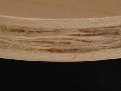 Natural Maple Round Art Panels have finely sanded edges all around the 5 layer construction.