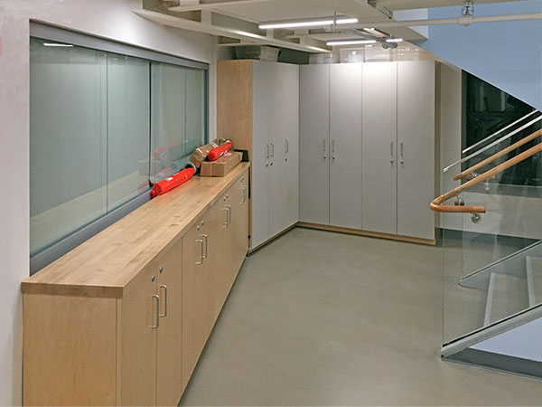 Additional art studio storage cabinets, and closets are conveniently located in the hallway between the art classrooms.
