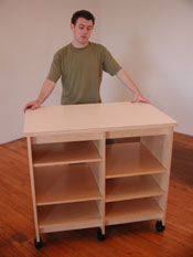 The Art Storage Trolley Work Table is 39.75" long, 36" tall with adjustible shelves to make and store flat art and art supplies.
