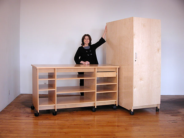 Art Storage desk and art storage cabinet with locking door.