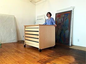 Art studio drawers on wheels for storing extra large art.