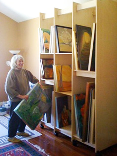 Art Storage System is 57" wide it has three 18" wide vertical storage sections each section has adjustable art storage shelves for storing art.