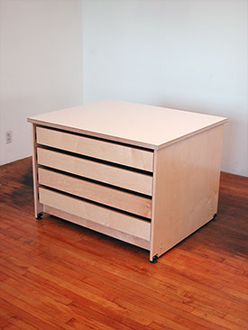 Flat Art Storage Drawer System for storing art has adjustable leveling feet.