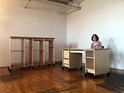 Art studio office desk and shelving system.