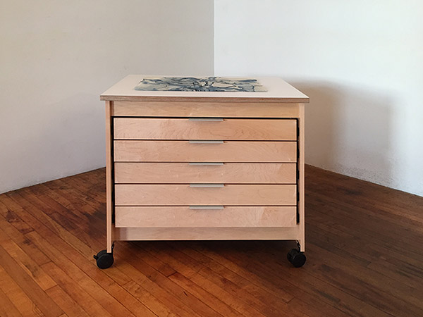 Mobile art studio furniture is made in Brooklyn by Art Boards™.  The deep art studio drawers hold art and art supplies. The art storage drawer fully extends to store and organize a variety of materials for watercolors.  Art Boards™ art studio cabinetry is made for artists, art schools, and home art studios. Art Furniture rolls on wheels that lock securely in place providing a mobile work surface for making art.