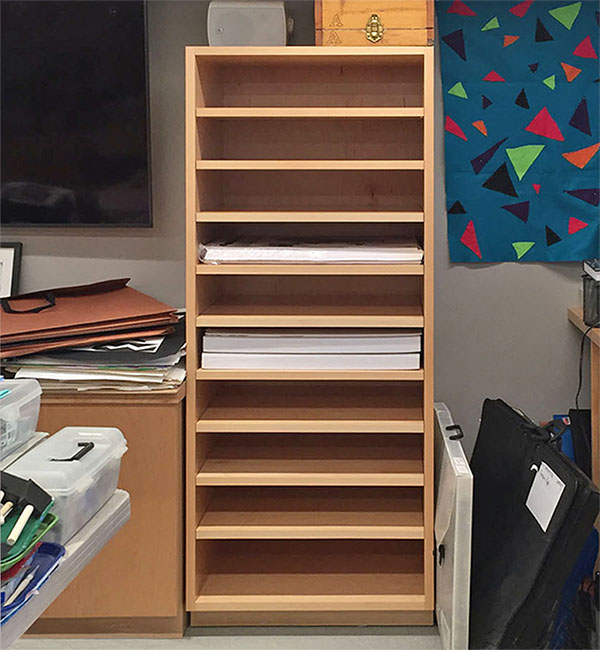 Adjustable shelves for art paper storage in the printmaking art room.