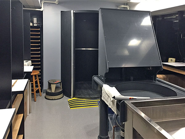 Revolving darkroom door at the end of the photo-lab is light tight and large enough for wheel chair access.