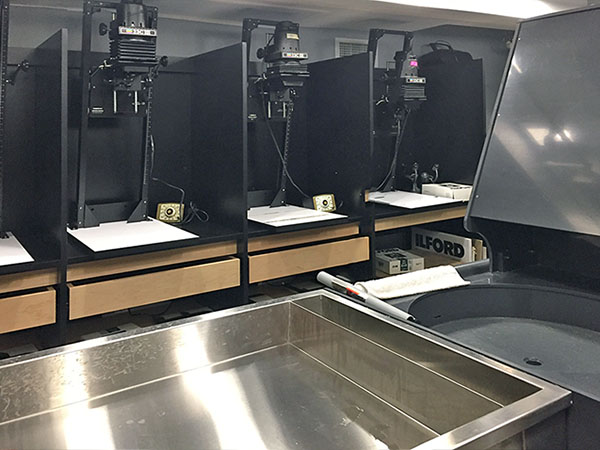 Professional darkroom facilities in photography departments photo lab for the creative use of students and teachers.