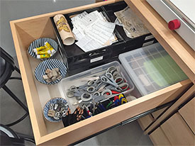 School Art Studio art supply drawers hold a wide variety of necessary tools and materials for making and teaching art.