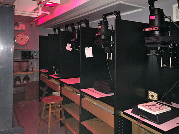 Darkroom Photography with shelving, sinks, and enlarger cabinets for photo developing, printing and photography storage.