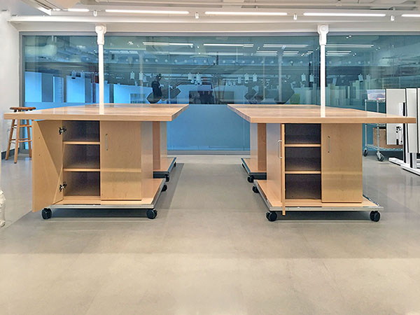 Each Art Studio Table has adjustable shelving behind doors for classroom studio storage of art, and artist supplies. Custom size furniture can be ordered.