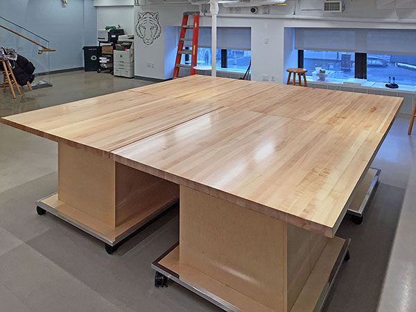 Four 48" square art studio table tops nested together to make one 96" x 96" art studio work surface. Custom size art studio furniture can be ordered from Art Boards™ Archival Art Supply, located in Brooklyn New York.