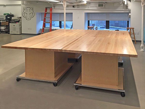 Four 48" x 48" separate rolling art studio tables nest together to make one 96" x 96" art room table. Tables can also be arranged end to end to make a banquet size table that measuring 4' x 12', or 4' x16' 