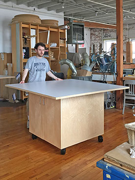 Art Studio Library Tables are on wheels with adjustable shelving located behind the doors for storing materials used in the library. Mobile Library Tables are designed by Art Boards™ Archival Art Supply.  Made for classrooms, artist studios, colleges, art studios, and school libraries.