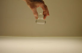 Small Muller held by 2 fingers. 