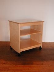 Art Storage System work table is 36" tall with storage below for flat art. Art Storage shelves will hold 24 x 30 artist papers. The Art Storage Table rolls on wheels that will lock in place.