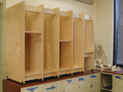 Art Storage System above metal art storage lockers in an art school college painting studio.